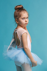 Image showing The little balerina dancer on blue background