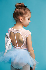 Image showing The little balerina dancer on blue background