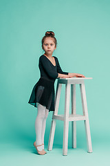 Image showing The little balerina dancer on blue background