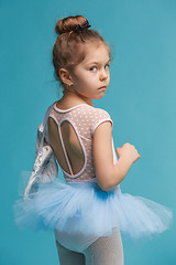 Image showing The little balerina dancer on blue background