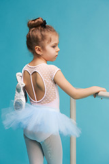 Image showing The little balerina dancer on blue background