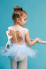 Image showing The little balerina dancer on blue background