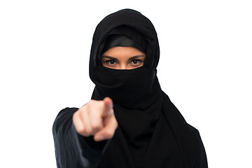 Image showing muslim woman in hijab pointing finger to you