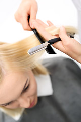 Image showing Haircut  chinese knife Chinese knife  At the hairdresser, hair cut with a razor