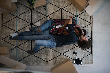 Image showing Top view of attractive young multiethnic couple