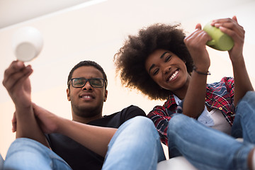 Image showing couple having break during moving to new house