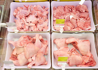 Image showing poultry meat in bowls at grocery stall