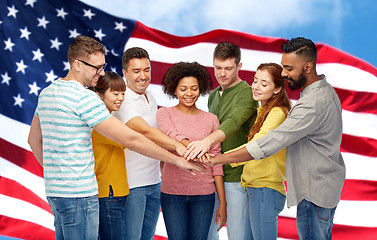 Image showing international group of happy people holding hands
