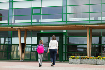 Image showing student girl with mother going to school