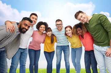 Image showing international group of happy people hugging