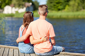 Image showing happy teenage couple hugging on river summer berth