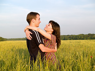 Image showing Teen Couple Embrasing in Field