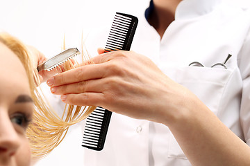 Image showing Chinese knife  At the hairdresser, hair cut with a razor