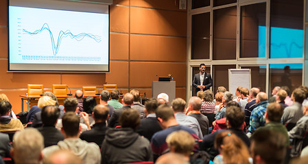 Image showing Business speaker giving a talk in conference hall.