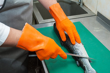 Image showing cutting salmon fish