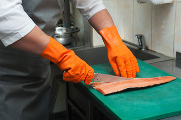 Image showing cutting salmon fish