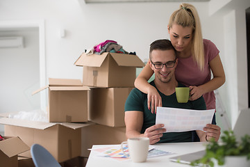 Image showing Young couple moving in a new home