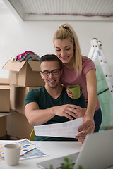 Image showing Young couple moving in a new home