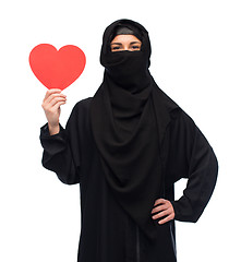 Image showing muslim woman in hijab holding red heart