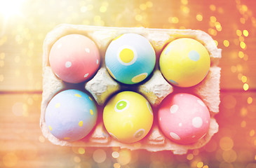 Image showing close up of colored easter eggs in egg box