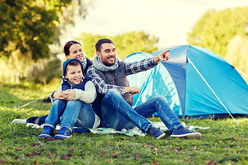 Image showing happy family with tent at camp site