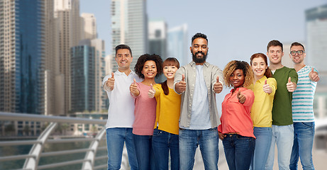 Image showing group of people showing thumbs up  in dubai