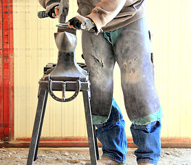 Image showing Male farrier.