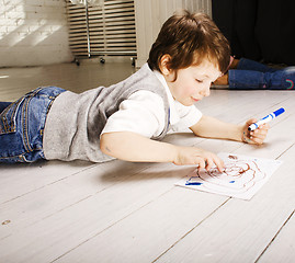 Image showing little cute boy painting at home, lifestyle people concept