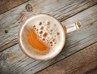Image showing beer mug on wooden table