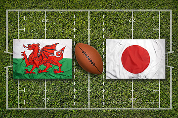 Image showing Wales vs. Japan flags on rugby field