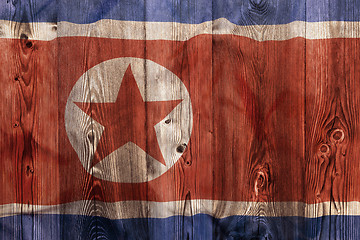 Image showing National flag of North Korea, wooden background