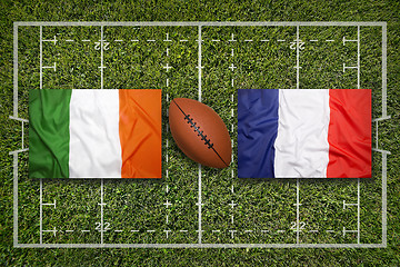 Image showing Ireland vs. Scotland\r\rIreland vs. France flags on rugby field