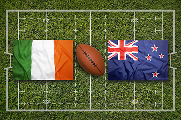 Image showing Ireland vs. New Zealand\r flags on rugby field
