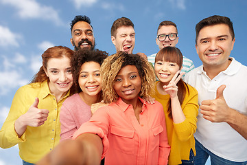 Image showing international group of happy people taking selfie