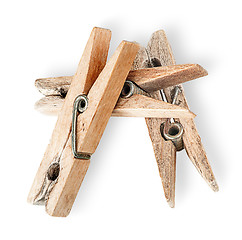 Image showing Heap of old wooden clothespins