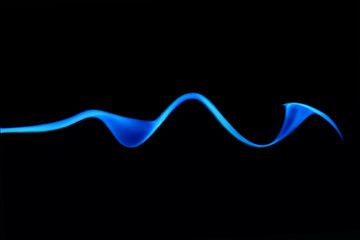 Image showing Trickle Of Blue Smoke On Black Background