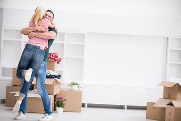 Image showing happy Young couple moving in new house