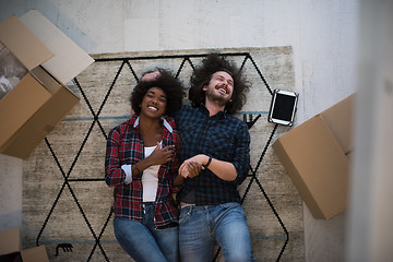 Image showing Top view of attractive young multiethnic couple