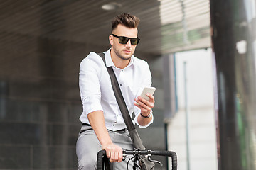Image showing man with bicycle and smartphone on city street