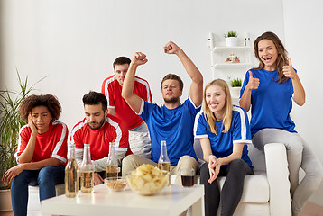 Image showing friends or football fans watching soccer at home