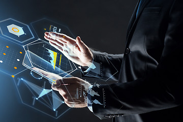 Image showing close up of businessman with transparent tablet pc