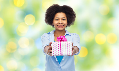 Image showing happy african woman with birthday gift box