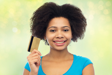 Image showing happy african american woman with credit card