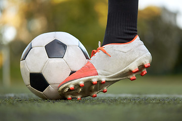 Image showing soccer player playing with ball on football field