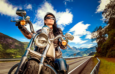 Image showing Biker girl on a motorcycle