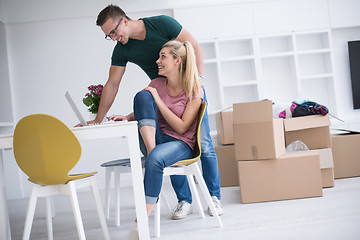 Image showing Young couple moving in a new home