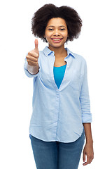 Image showing happy african american woman showing thumbs up