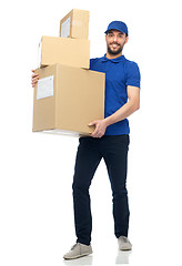 Image showing happy delivery man with parcel boxes