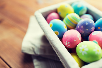 Image showing close up of colored easter eggs in basket