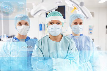 Image showing group of surgeons in operating room at hospital